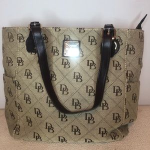 Light brown and black Dooney and Bourke bag